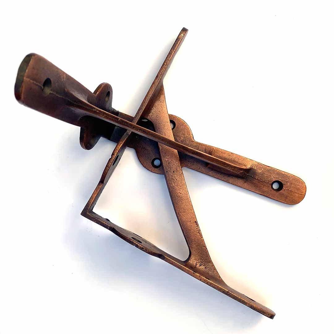 copper gallows style brackets on a white back groud