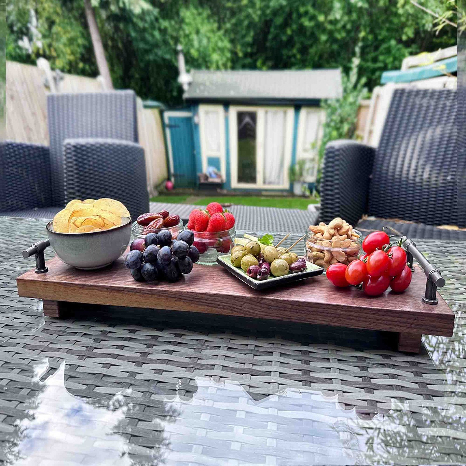 walnut serving tray with cast iron handles and afternoon tea set out